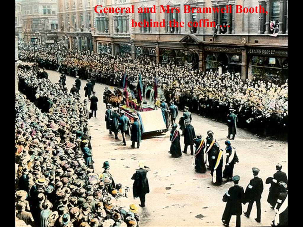 General and Mrs Bramwell Booth,. behind the coffin ….